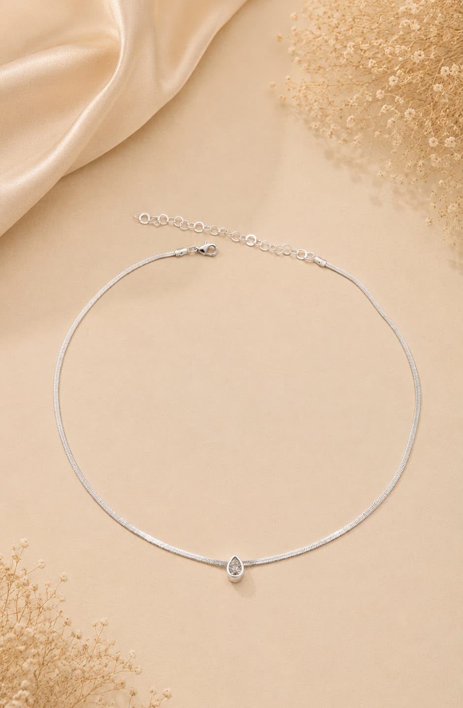 Colar Serpentina — pingente gota com ponto de luz banhado a ouro 18K